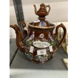 20th cent. Ceramics: Treacle barge ware, possibly Rockingham, double spout teapot with lid and