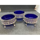 Hallmarked Silver: Set of three large silver salts, Birmingham 1893, with blue cut glass liners.
