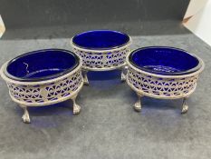 Hallmarked Silver: Set of three large silver salts, Birmingham 1893, with blue cut glass liners.