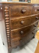 19th cent. Mahogany bow front chest of drawers on bracket feet with shaped front apron, turned