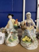 20th cent. Ceramics: Dresden figures, he seated with a cockerel, she feeding a hen and chicks, a