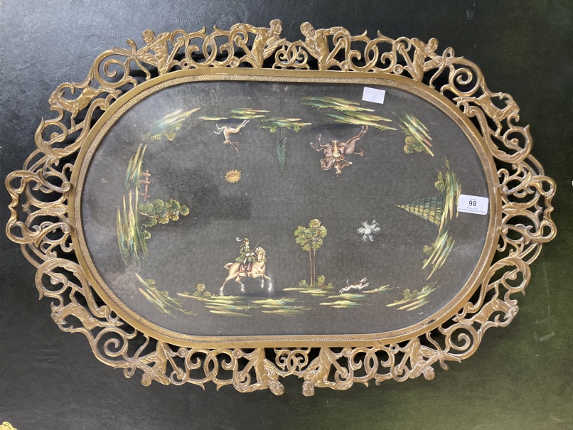 19th cent. Gilt brass tray with central glazed section depicting hunting scenes. 25ins.