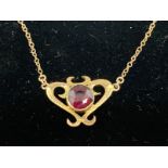 Jewellery: Art Nouveau ladies yellow metal pendant an 22ins chain, tests as 9ct gold. 2.7g.