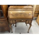 20th cent. Mahogany roll top desk, the roll top opens to reveal three drawers with three further