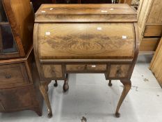 20th cent. Mahogany roll top desk, the roll top opens to reveal three drawers with three further