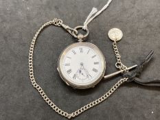 Hallmarked Silver: open faced pocket watch key wind white dial with black Roman numerals and a watch
