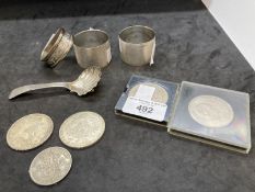 19th cent. Silver three napkin rings. 3oz. Plus a caddy spoon and five coins.
