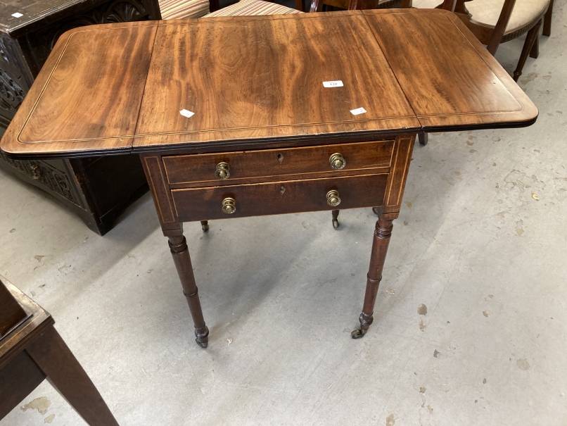 Early 19th cent. Mahogany work table with ebonised stringing on ring turned supports on brass - Image 2 of 3