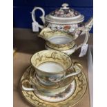 Early 19th cent. Derby Imari pattern teapot, Staffordshire trio and milk jug, yellow and gilt ground