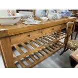 20th cent. Oak kitchen island/buffet with three drawers and two slatted shelves. Approx. 72ins. x