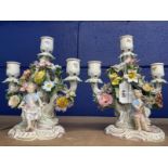 19th cent. Meissen three branch candelabra one with a putti playing a violin, another dancing, a