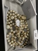 Jewellery: Christian Dior costume jewellery in the form of a Mise en Dior vintage gold tone with