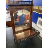 19th cent. Rosewood hanging shelf mirror fretwork shelf and gallery inlaid decoration with urn