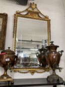 20th cent. Modern bevel edge mirror with ornate gilt surround and swag decoration. Overall size