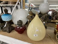 Lighting: 19th and 20th cent. Oil lamps and glass shades, plus two metal North African lamps.