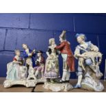 19th/20th cent. Continental Figurines: Musical trio woman and two males, Vienna figure of a young