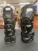 South American black glass/obsidian tribal heads. 9ins. (2)