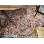 Carpets & Rugs: 20th cent. Persian carpet, pink ground the central panel with leaf and floral