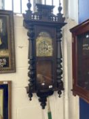 Clocks: Art Nouveau regulator with brass face and stylised spandrels. 43ins.