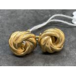 Hallmarked Jewellery: Pair of 9ct gold knot earrings with peg and clip fittings. Weight 10g.