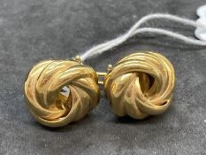 Hallmarked Jewellery: Pair of 9ct gold knot earrings with peg and clip fittings. Weight 10g.