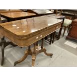 20th cent. Mahogany swivel top fold over card table, the four swept legs on brass castors supporting