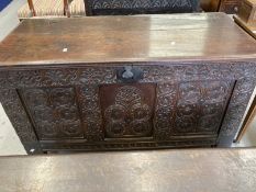 19th cent. Oak coffer, carved panels to the front, two plain panels to the sides and three plain