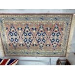 Carpets & Rugs: 20th cent. Caucasian carpet, possibly Shirvan, pink ground with the large central