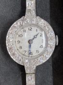 Jewellery: Early 20th cent. Ladies cocktail/evening watch. Diamond set dial (assessed 1.17ct) and