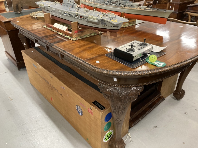 19th cent. Mahogany extending dining table with a Joseph Petter winding mechanism, ornately carved