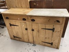 20th cent. Stripped pine cupboard/dresser base with marble top, two drawers over two doors.