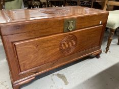 20th cent. Camphor trunk, carved front and lid which lifts to reveal sliding tray. With original