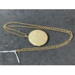 Hallmarked Jewellery: 9ct gold oval hinged locket. 1¼ins. x 1ins. Weight 20.7g.