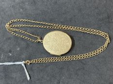Hallmarked Jewellery: 9ct gold oval hinged locket. 1¼ins. x 1ins. Weight 20.7g.