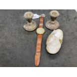 Watches: Gentleman's gold plated rotary Quartz strap watch, filled silver mantel sticks. Weight 4.