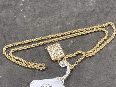 Jewellery: Yellow metal rope chain 24ins, and a pierced pendant. Tests as 9ct gold. Total weight
