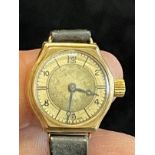 Watches: Ladies 9ct gold round Arabic dial on black strap. Gentleman's stainless steel Cyma