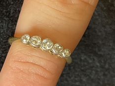 Hallmarked Jewellery: 18ct gold ring set with five graduated diamonds, estimated weight of (5) 0.