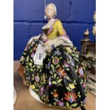 A Samson crinoline figure of a lady of the 'Mopsorden' late 19th century, after Kändler's model at