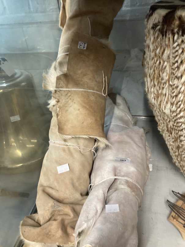 Africa/Tribal Art /Textiles: Four goat hide rugs ( two large, one medium, one small), Nigeria.