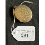 Jewellery: Yellow metal oval engraved locket, 40mm x 33mm, tests as 9ct gold. Weight 12.5g.