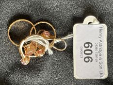 Jewellery: Yellow metal two rings one set with a single amethyst with leaf decoration, ring size