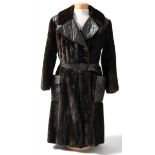 Elvis Presley Personally-Owned and Worn Custom-Made Leather and Mink Coat: Offered is a custom-