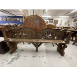 20th cent. Chinese carved bench with dragons carved on the back, showing signs of original paint.