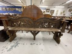 20th cent. Chinese carved bench with dragons carved on the back, showing signs of original paint.