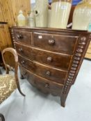 19th cent. Mahogany bow front chest of drawers on bracket feet with shaped front apron, turned