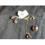 Yellow Metal Jewellery: One 18ins chain with a kite shaped amethyst pendant attached, a spray brooch