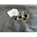 Hallmarked Jewellery: Three 9ct gold dress rings, two size O and one size L. Total weight 8.3g.