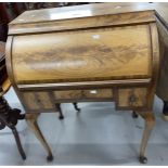 20th cent. Mahogany roll top desk, the roll top opens to reveal three drawers with three further