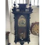 Clocks: Art Nouveau regulator with brass face and stylised spandrels. 43ins.